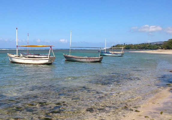 Boats on the beach of the restaurant