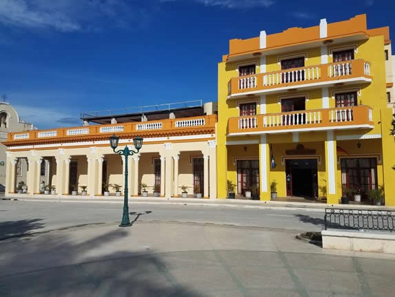 colonial buildings in front of a square