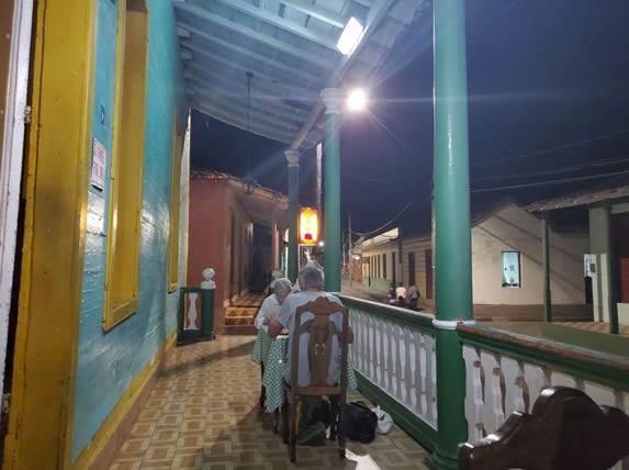 portal with wooden furniture at night