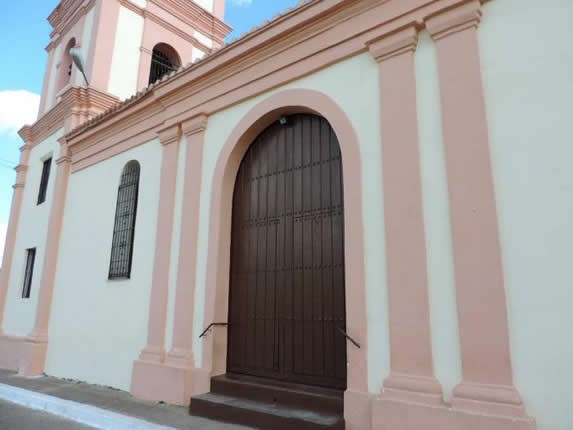 huge wooden entrance door to the church