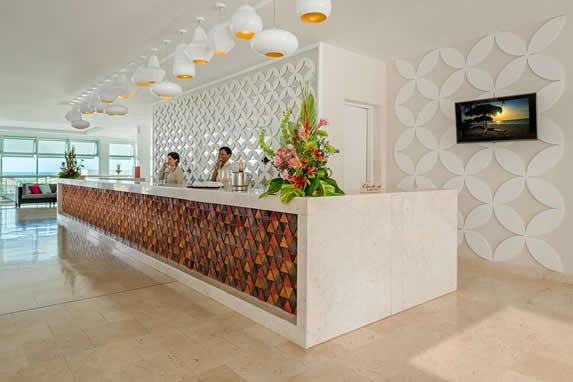 reception desk with colorful flowers