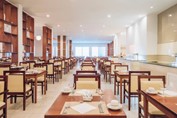 Wooden furniture in the hotel restaurant