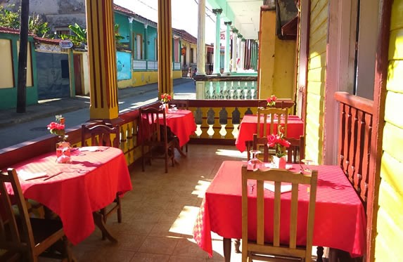 colorful portal with wooden tables