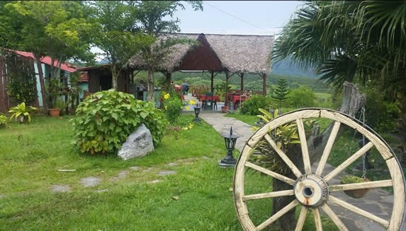 guano ranchon surrounded by greenery