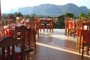 restaurant with balcony and mountain view