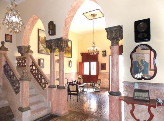 living room with marble walls and wooden furniture