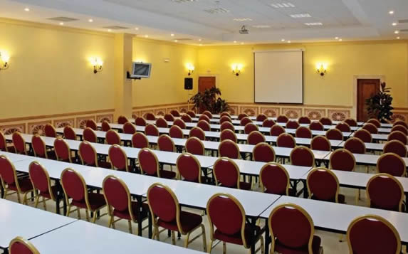 meeting room with tables and chairs