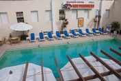 aerial view of the pool surrounded by sun loungers