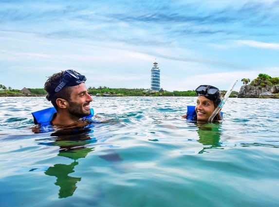 Tourists snorkeling