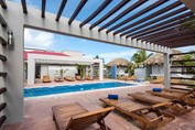 spa with wooden loungers and pool