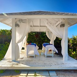 massage beds under wooden gazebo