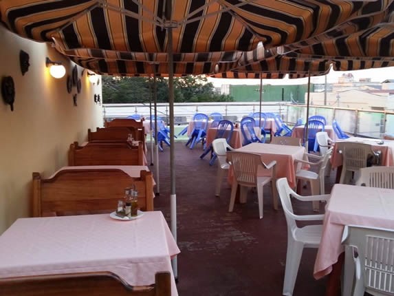 terrace with furniture and canvas roof