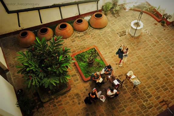 inner courtyard with old jars and well