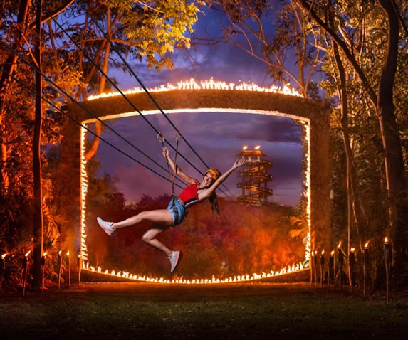 Zip lines at night at Xplor Fuego