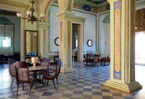 interior of a colonial building with furniture