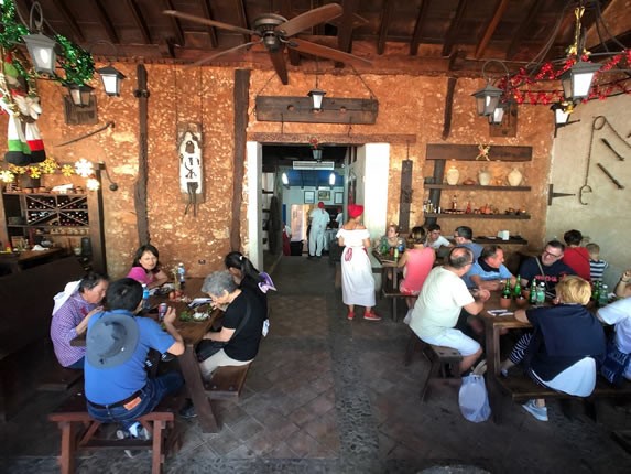  Rustic restaurant lounge with people eating