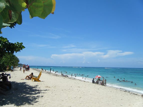 tourists on the beach with golden sands 