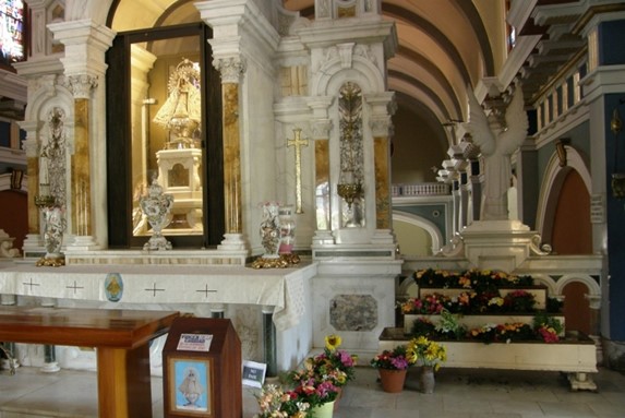 marble sanctuary with the figure of a virgin