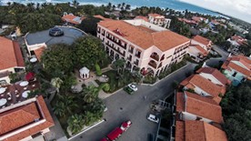 aerial view of the hotel with sea and vegetation