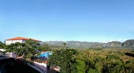 aerial view of the hotel surrounded by mountains