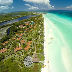 aerial view of the hotel by the sea and the lagoon