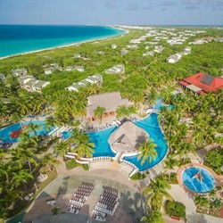 aerial view of the hotel surrounded by greenery