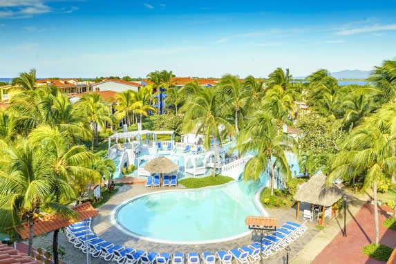 aerial view of the pool surrounded by greenery