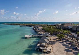 aerial view of the hotel by the blue sea