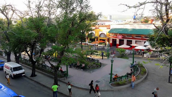 aerial view of an oval square surrounded by trees