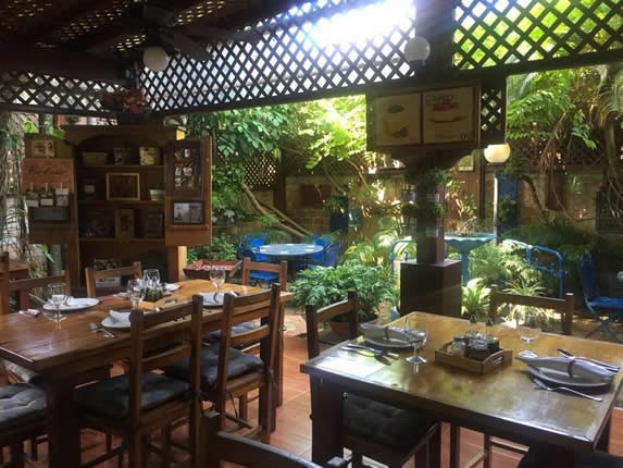 Patio with large vegetation in the restaurant